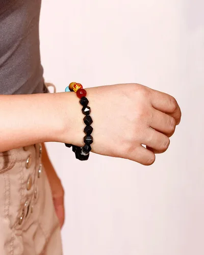 Vista 9 de XHUUU Pulsera de 7 chakras con estatua de calavera para mujeres y hombres, obsidiana negra, corte estrella, cristales reales y piedras curativas