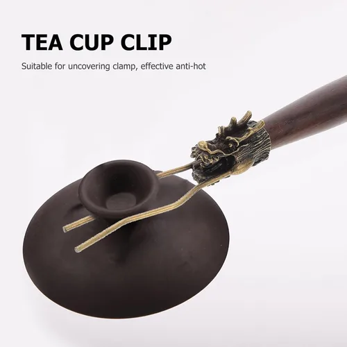 Vista 2 de Wakauto Clip de tapa para tetera, aislamiento térmico, cubierta para tetera, tenedor con mango de madera, soporte de tapa para tetera japonesa