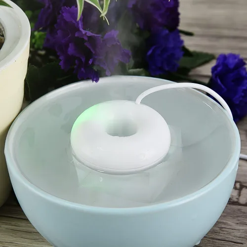 Vista 2 de Yoidesu Portátil Mini USB Vaporizador Humidificador Evaporativo Humidificador en forma de rosquilla para el hogar Oficina Coche (blanco)