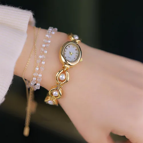 Vista 3 de BESTKANG Elegante reloj de pulsera vintage dorado para mujer, reloj de cuarzo con esfera ovalada, reloj de pulsera impermeable para mujer
