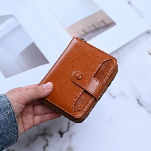 Vista 2 de Billetera pequeña para mujer con bloqueo RFID, cierre de cuero, bolsillo para monedas, tarjetero, con ventana de identificación, Marrón