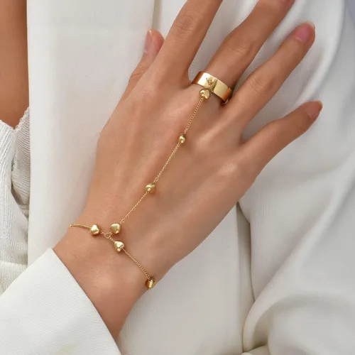 Vista 2 de Pulsera de anillo de cadena de oro esclavo de mano, pulsera de corazón para dedos, cadena de arnés de mano, joyería de moda para mujeres y niñas