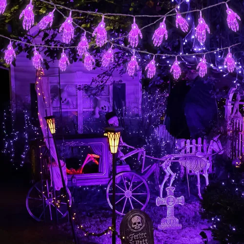 Vista 4 de JMEXSUSS Guirnalda de luces moradas de Halloween, 15.2 pies, 30 luces LED de mano de esqueleto, funciona con pilas, luces de Halloween