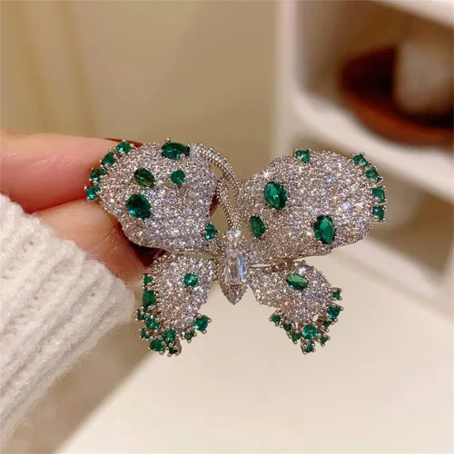 Vista 3 de Delicados broches de mariposa verde esmeralda con circonita cúbica, broche de lujo con cristales brillantes clásicos para bodas, fiestas, banquetes