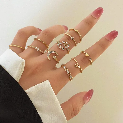 Vista 3 de KISS WIFE Juego de anillos apilables dorados para nudillos y estrellas de luna para mujeres y adolescentes, anillos apilables ligeros y bohemios