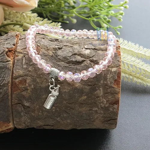 Vista 5 de WE Pulsera elástica de cristal rosa para baby shower (12 piezas)