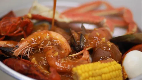 Vista 4 de Juicy Shrimp Shack Salsa de mariscos cajún, salsa de inmersión cajún, mezcla de salsa de condimento cajún, hervir mariscos