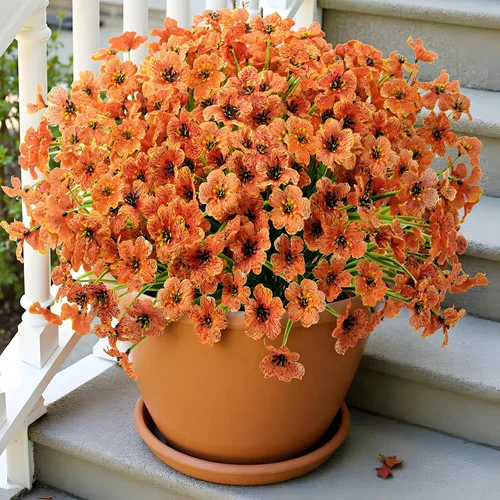 Vista 10 de Uieke 24 flores artificiales de otoño para exteriores, resistentes a los rayos UV, plantas de otoño sintéticas, arbustos que no se decoloran, Naranja