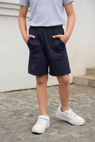 Vista 2 de Coutgo Pantalones cortos deportivos para niños y niñas, pantalones cortos de entrenamiento con bolsillos de 5 a 14 años