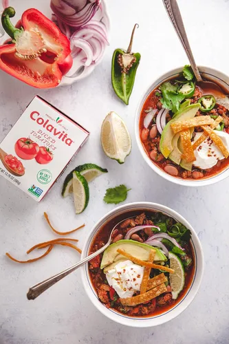 Vista 7 de Colavita Tomates italianos en dados, perfectos para salsas gruesas y platos de pasta, o como decoración para bruschetta y sopas, caja de recreación