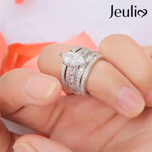 Vista 2 de Jeulia Juego de anillos de boda de 2 quilates de 3 piezas para mujer, anillos de compromiso de circonita cúbica de corte marquesa de plata de ley