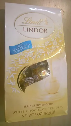 Vista 66 de Lindt Lindor - Trufas de chocolate extra oscuro 60 %, caramelo de chocolate negro con centro de trufa suave y derretida, ideal para regalar, 5.1