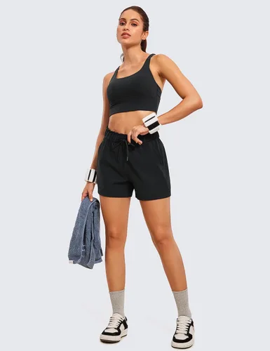 Vista 3 de CRZ YOGA Pantalones cortos deportivos elásticos en 4 direcciones para mujer, de cintura alta, cómodos pantalones cortos casuales de trabajo
