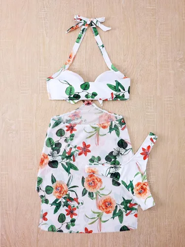 Vista 3 de WDIRARA Traje de baño de 3 piezas con estampado floral y escote halter con falda de playa dividida para mujer