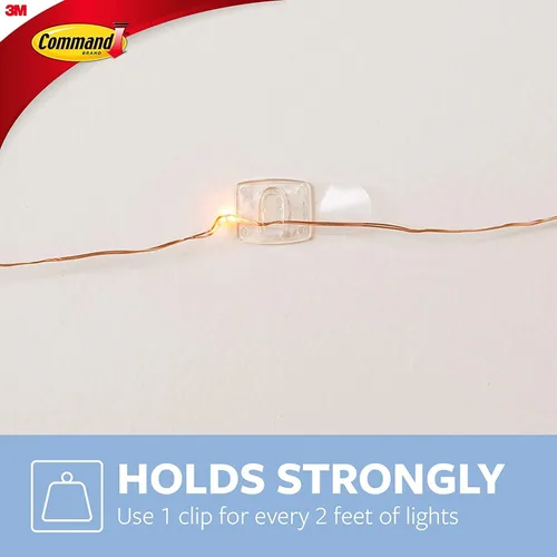 Vista 5 de Perchas 3M Claw para cuadros para yeso con capacidad de 15 libras y mini clips de luz Command, 45 clips, tiras 54