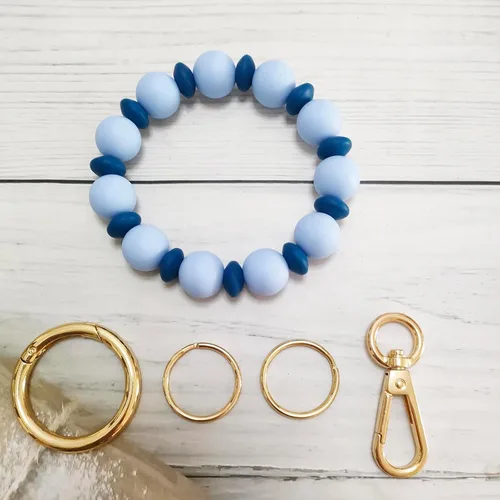Vista 3 de Junyuerly Pulsera Llavero de Silicona con Cuentas para Mujeres, Brazalete Elástico con Anillo de Llaves Cuenta azul