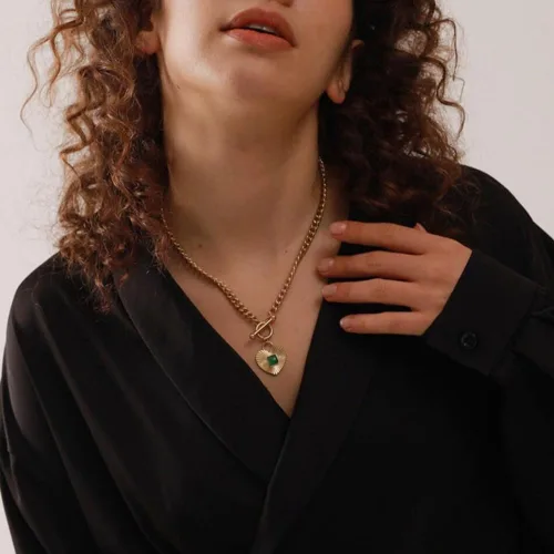 Vista 2 de NUZON 2 tonos entrelazados Corazón de explosión de sol CZ mal de ojo Pera única Collar con colgante de corazón de amor para mujer, collar