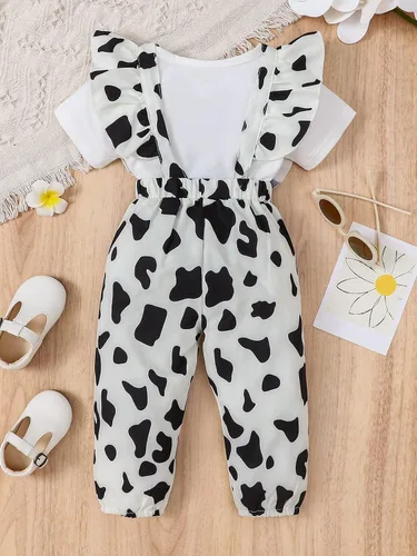Vista 2 de WDIRARA Conjunto de 2 piezas con estampado de vaca, pantalones con tirantes y camiseta de manga corta para bebé niña