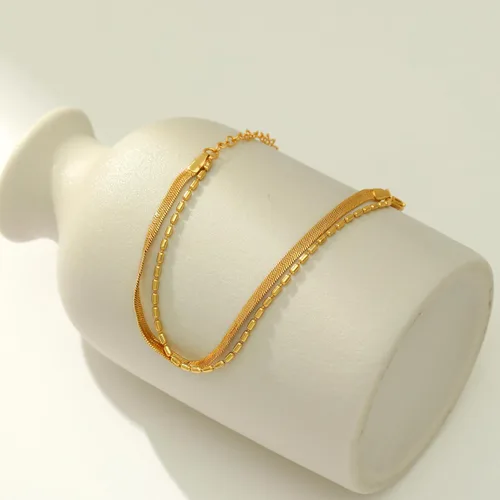 Vista 6 de Caenyo Pulseras de oro para mujer, chapadas en oro de 14 quilates, pulseras de espiga cubanas en capas, pulsera ajustable de cadena de perlas