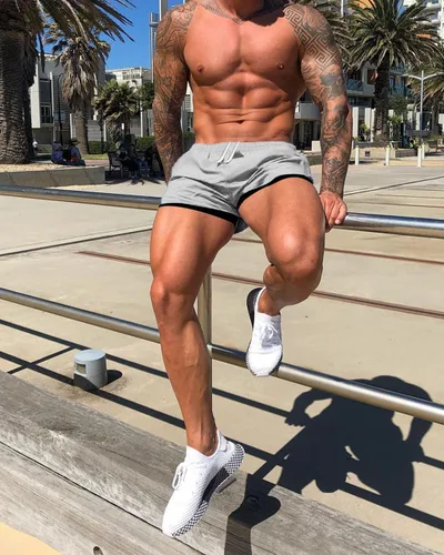 Vista 4 de Traje de baño para hombre con forro para correr, pantalones cortos de entrenamiento, pantalones cortos de gimnasio con laterales grandes divididos