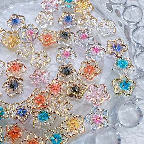 Vista 8 de 50 dijes de uñas acrílicas 3D coloridas con borde dorado, resina esmaltada, para uñas, pétalos, arte de uñas, dijes florales para mujer, arte de uñas