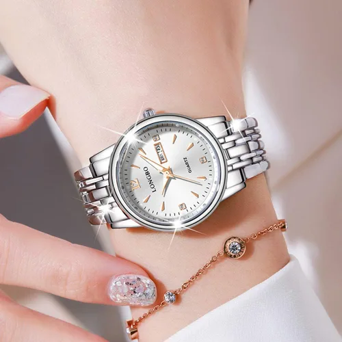 Vista 4 de Reginald Relojes de moda para mujer, manos de zafiro, acero inoxidable, impermeable, esfera de cuarzo, fecha, semana