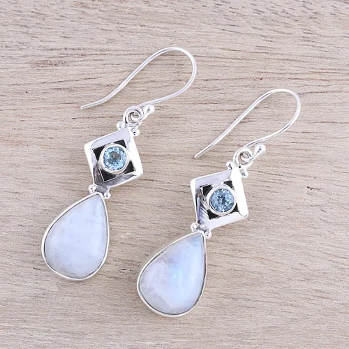 Vista 4 de NOVICA Aretes colgantes hechos a mano con piedra lunar y topacio azul, lágrima, plata de ley 925, piedra natal india 1.7 pulgadas de largo x 0.4
