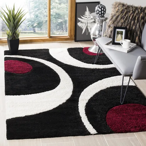 Vista 2 de SAFAVIEH Florida Shag Collection - Alfombra de área de 5 pies 3 pulgadas x 7 pies 6 pulgadas, color negro y marfil, diseño abstracto, no desprende