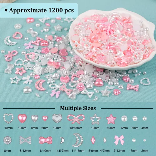 Vista 7 de 1200 piezas de dijes de uñas 3D con formas múltiples y perlas de base plana, estilos mixtos blanco y rosa, corazones, estrellas, lazos, girasoles