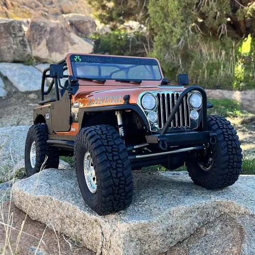 Vista 2 de Axial 1/10 SCX10 III Jeep CJ-7 4X4 RTR cepillado RC Rock Crawler, cobre