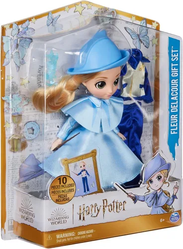 Vista 9 de Wizarding World Harry Potter, set de regalo de muñeca Fleur Delacour de 20,3 cm de 10 piezas con 2 trajes y 8 accesorios para muñeca, juguetes