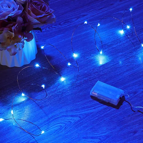 Vista 9 de Mikasol - Guirnalda de luces de pilas, 1 paquete de cadena de luces LED que funcionan con 3 pilas AAA, de alambre de cobre, luces para decoración