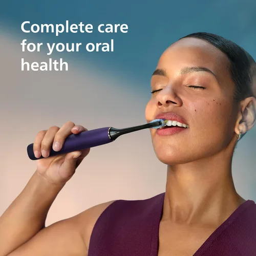 Vista 2 de Philips Sonicare 9000 Edición Especial Cepillo de dientes recargable, Negro/Morado, HX9911/91 1000% More Plaque Removal¹, Visual Pressure Sensor
