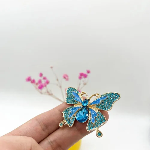 Vista 2 de 3 pomos de cajón de mariposa con diamantes azules, únicos de metal, animales, tiradores de gabinete, manijas brillantes para decoración de muebles