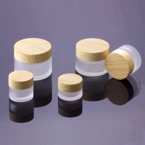 Vista 5 de Juego de 10 botes de 0.18 oz y 0.2 fl oz de vidrio esmerilado, con tapa de plástico con textura de madera, rellenables