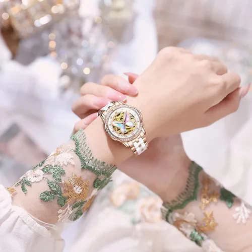 Vista 2 de OLEVS Reloj de moda para mujer, relojes automáticos para mujer, de cuerda automática, de cerámica, acero inoxidable, impermeable, luminoso, diamantes