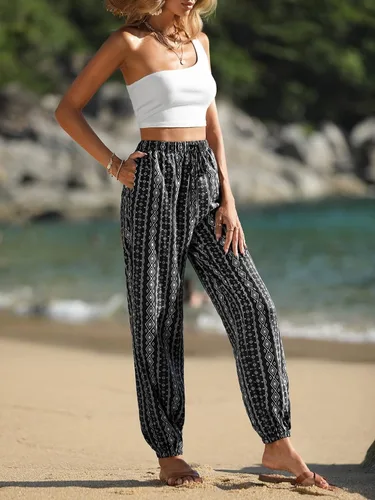 Vista 4 de SOLY HUX Pantalones acampanados con estampado floral de rayas tribales para mujer, cintura alta elástica, pierna acampanada, pantalones acampanados
