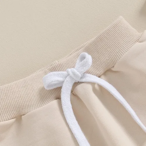 Vista 5 de Mubineo Pantalones deportivos básicos lisos para bebés, niños y niñas, cómodos pantalones de algodón con bolsillos