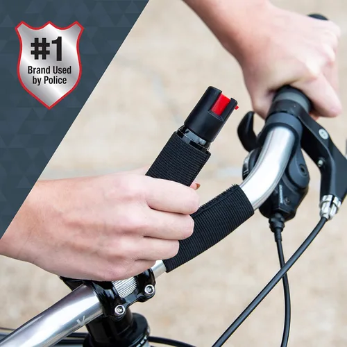 Vista 3 de SABRE Cyclist Pepper Spray con correa ajustable para bicicleta, 45 ráfagas, rango de 10 pies (9.8 ft), diseño de gancho y bucle extraíble para un