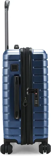 Vista 3 de Traveler's Choice Archer - Juego de equipaje giratorio de policarbonato duro, azul, 21 pulgadas, correas de amarre