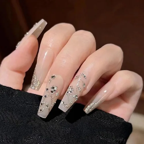 Vista 23 de MISUD Uñas postizas largas con diseño de ataúd con oro negro, diseño acrílico de copo de nieve con purpurina, 24 piezas