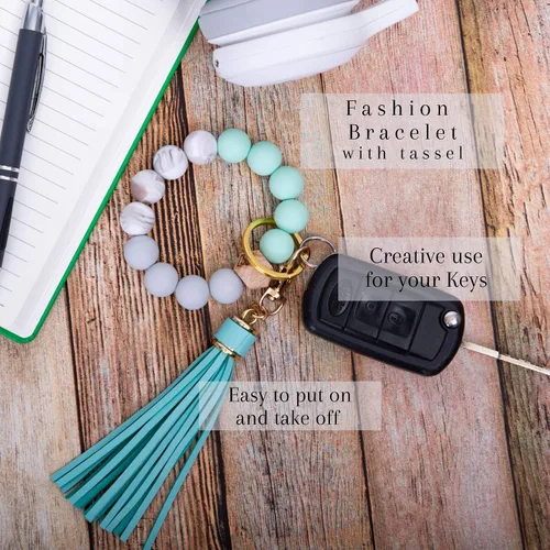 Vista 4 de dizzy creek designs Llavero pulsera, pulsera de cuentas de silicona para mujer, llavero con borla de cuero