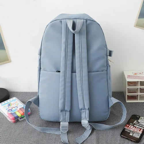 Vista 4 de Mochila linda de anime para estudiantes, bolsa de viaje casual de dibujos animados para niños y niñas, mochila de temporada escolar (azul claro)