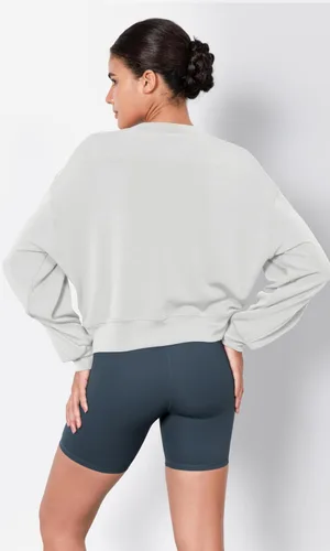 Vista 2 de ODODOS Sudaderas cortas de manga larga suaves de modal para mujer, de gran tamaño, cuello redondo