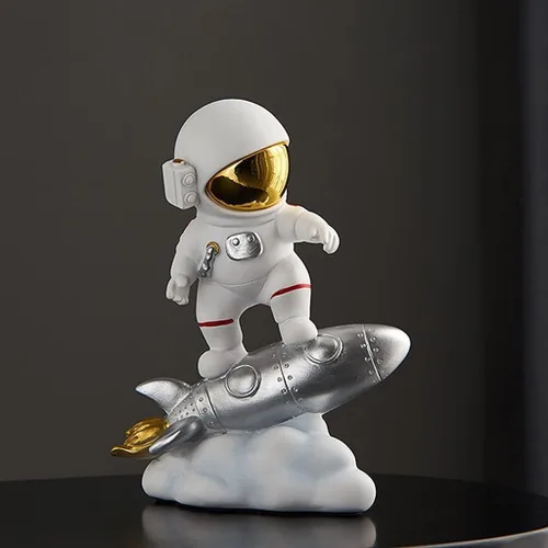 Vista 4 de Figura de astronauta de resina, escultura de astronauta, estatua del espacio exterior para decoración del hogar, adorno de oficina, cohete plateado