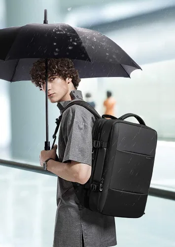 Vista 2 de BANGE Mochilas de viaje de 35L, mochila de mano expandible para aviones, mochila impermeable para laptop de 17.3 pulgadas para hombres y mujeres