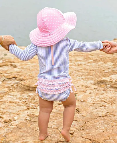 Vista 2 de RuffleButts - Traje de baño de manga larga, de una pieza, para bebéniñas, con protección solar UPF 50+