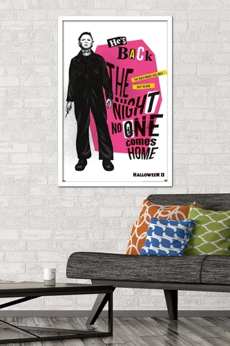 Vista 2 de Trends International Halloween II - Póster de pared con texto en inglés "He's Back", 22.37 x 34.00 pulgadas, versión enmarcada en blanco