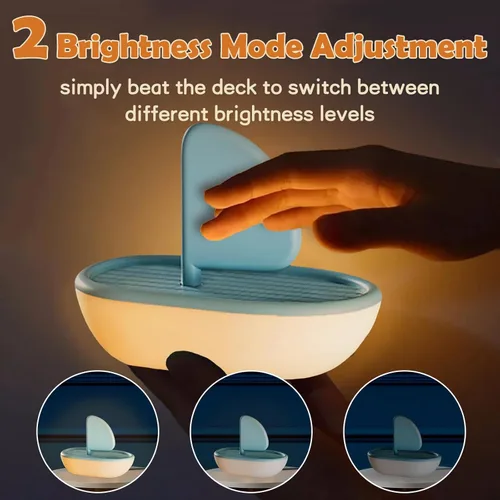 Vista 3 de Bonita luz nocturna de velero musical, lámpara de dormir de silicona suave, luz de noche recargable por USB para decoración de habitación, regalo