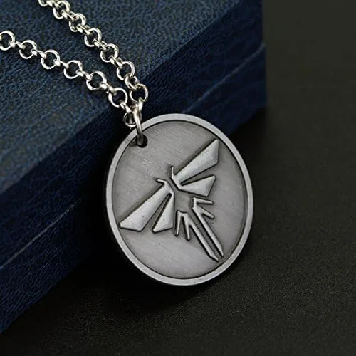 Vista 4 de SONGCHANGJEWELRY Last of Us Keychain Joel Backpack Spaceship Rocket Cosplay Metal Keychain Christmas Gifts for Men Fan Teens